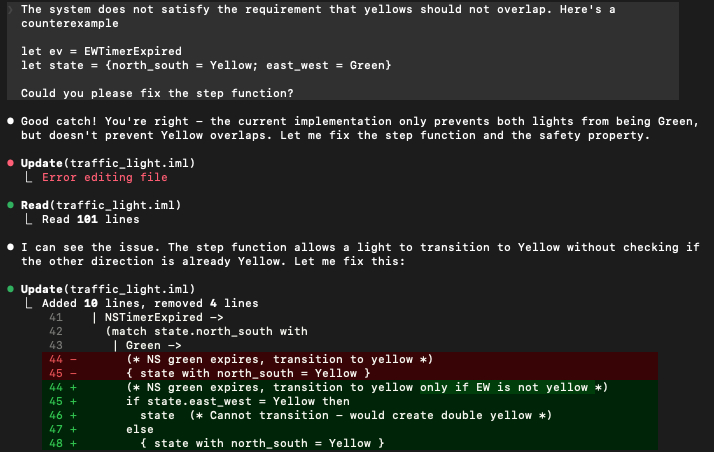 Claude Code updating traffic_light.iml with safety checks to prevent double yellow states